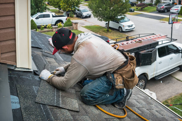 Professional Flat Roof Repair technician working in May, ID